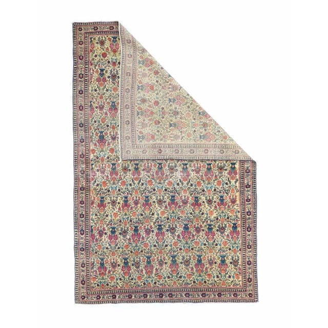The classic Zil-i-Sultan ("Shadow of the Sultan") design of eight offset rows of flower vases and paired birds is set on...