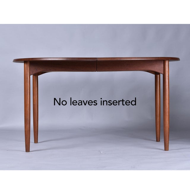 1950s Expanding Round to Oval Early Danish Teak Dining Table With 2 Leaves For Sale - Image 5 of 14