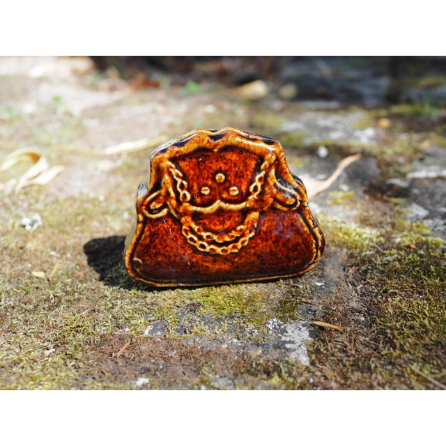 1900 French Ceramic Handbag Shaped Moneybox. This antique piece bring a classic girly touch in most interiors, it...