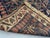 Antique Afghan Baluchi Distressed Runner Rug With Faded Tribal Geometric Design Rug For Sale - Image 10 of 11