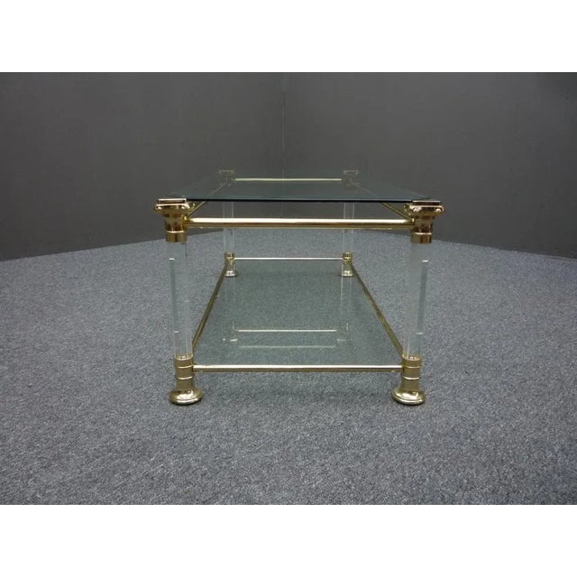 Beautiful side table from Italy. from first owner and in very good original condition. The table has 2 glass plates. Frame...
