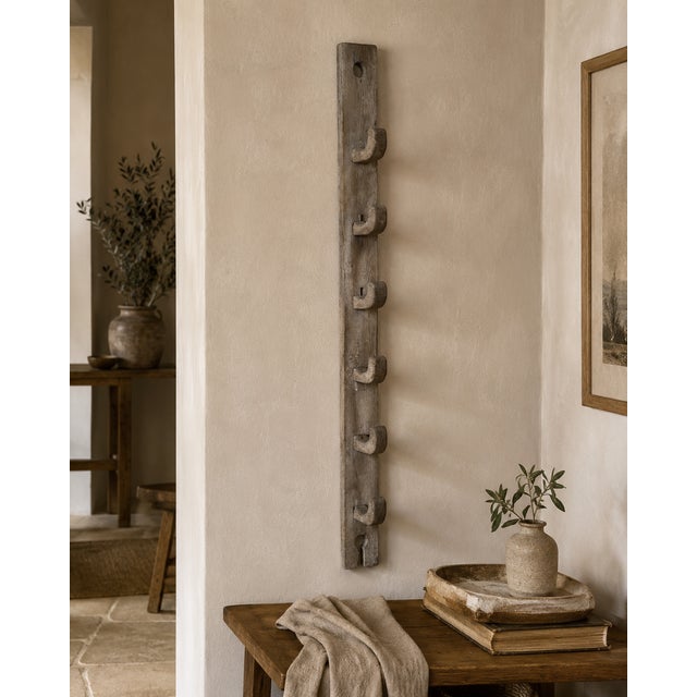 A wonderfully sculptural 19th-century English stable harness or bridle rack, constructed from weathered hardwood, likely...