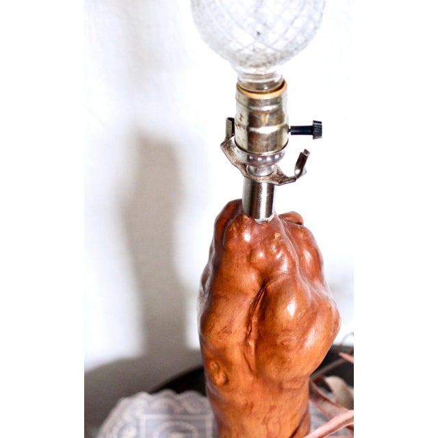 Vintage cypress knob lamp with a great organic shape. Painted dark base with decorative holes and the original wiring....
