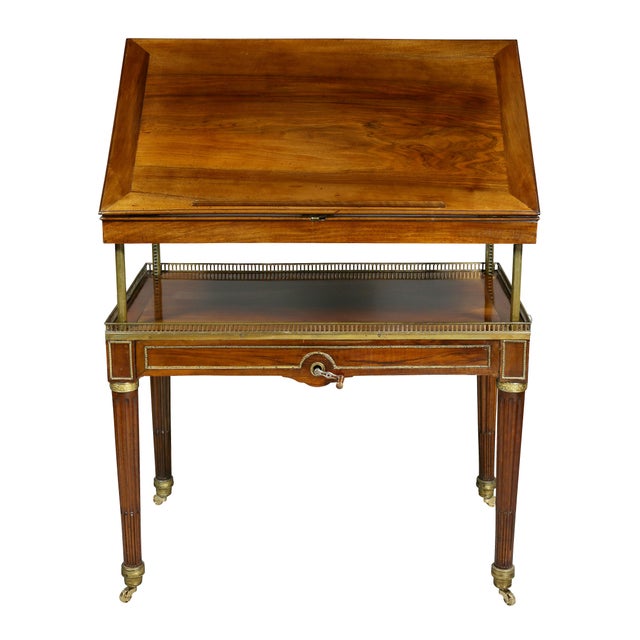 A fine and unusual piece with gilt bronze mounts, when in table position rectangular with a ratcheted adjustable slant lid...