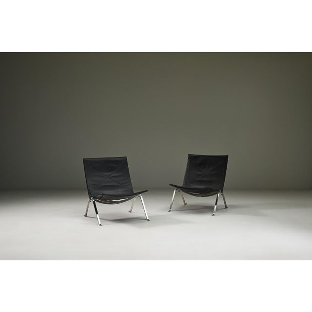 Set of two pk22 lounge chairs by poul kjærholm for fritz hansen, 1950s denmark. This set of pk22 lounge chairs is one of...