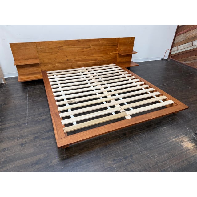 Design Plus Gallery presents a King Size Andes Acacia Bed designed by Mark Daniel of Slate Design for Cb2. Acacia veneer...