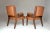 An exceptional set of two mid-century office or side armchairs that were produced for the Moroccan Royal secretary office...