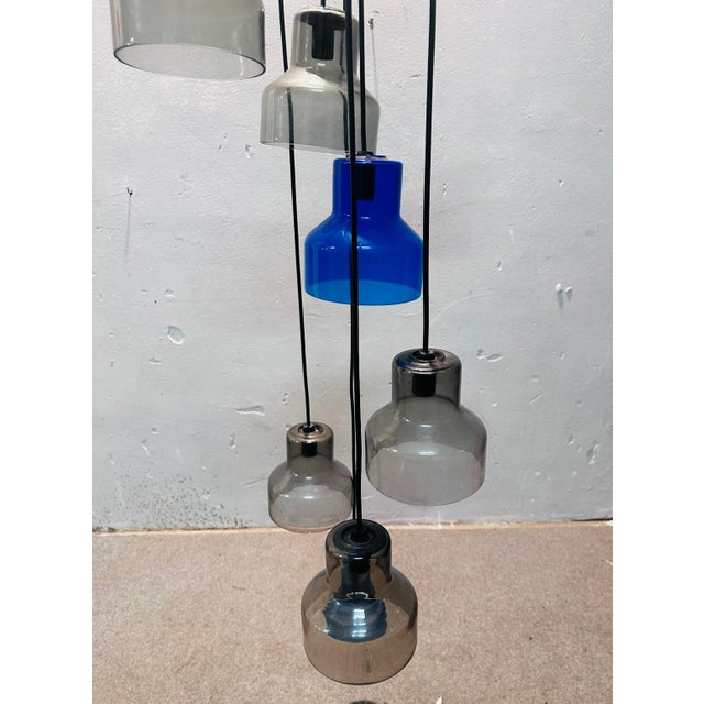 Chandelier by Peter Penzel for Vistosi | Murano Glass and Metal | 1960s Elegant and sophisticated chandelier designed by...
