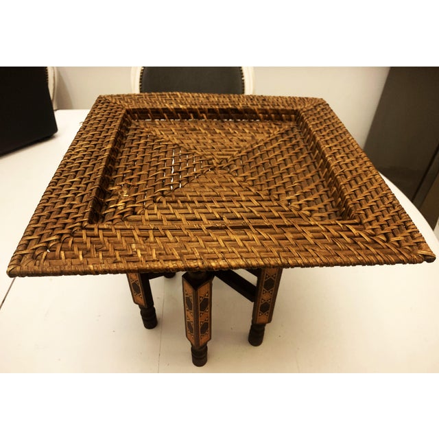 Folding small wooden stand with exotic tray. Small flower table or any purpose. from the 1960s. Inlaid teak legs, top made...