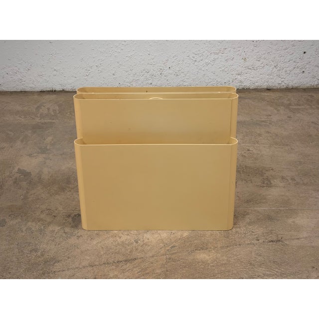 Model 4676 Magazine Rack by Giotto Stoppino for Kartell, 1970s, in Good conditions. Designed 1970 to 1979 This piece has...
