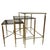 For sale is this great set of vintage nesting tables that are made out of brass with smoke glass tops.