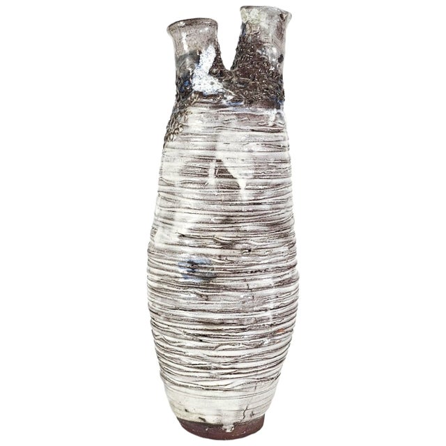 This vintage studio pottery vase is a hand-built sculptural form constructed using a coil-building technique that leaves...