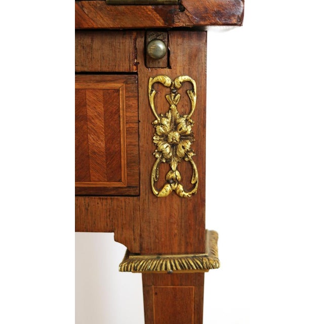 A Louis XVI-era drop-leaf desk (bonheur-du-jour), entirely handcrafted in a high-end workshop. Probably made in Turin in...