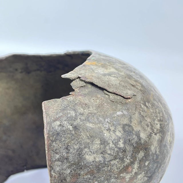 This substantial copper ankle cuff reflects the Mboleâs classic, elegant designâa slightly flattened circular form...