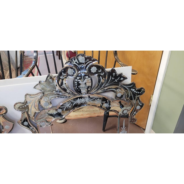 Fine pair of Venetian style etched and beveled glass petite wall mirrors. Eash measures 23 inches wide by 33 inches tall....
