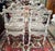 Group of 4 chairs from the 19th century, finely carved, decorated with griffins and angels. The chairs are in solid wood,...