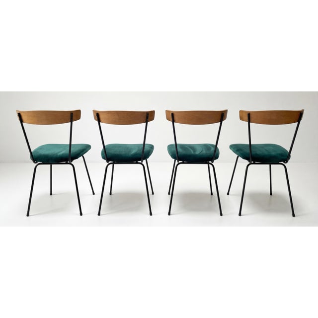 Set of four Mid-Century Modern dining chairs Attributed to Clifford Pascoe featuring iron frames and bentwood backs. Newly...