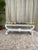 This substantial 48 inch long white bench is upholstered in Kravat Delacroix fabric. It's such a fun piece and would be...