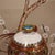Vintage Chinese Cloisonné Meiping Vase | White Ground Phoenix & Peony Motif With Stand For Sale - Image 9 of 10