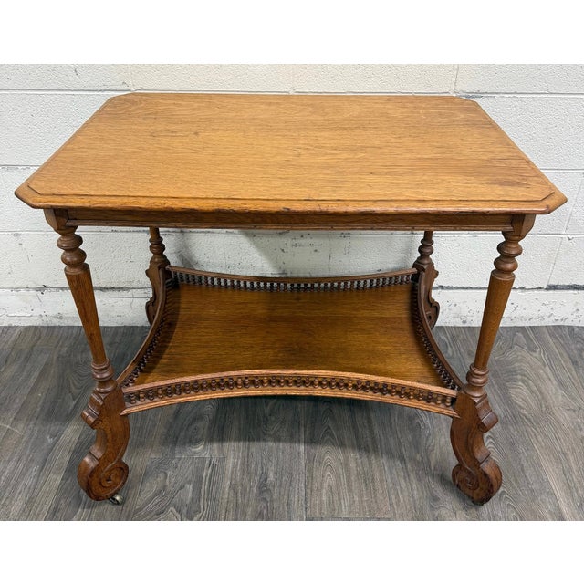 This is a stunning antique Victorian Eastlake hall table, console table, or library table crafted from solid oak, dating...