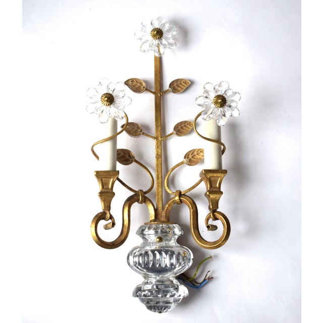 Wall lamp made of gold-plated metal and beautiful crystal flowers, crafted from a series of interconnected crystals. Two...