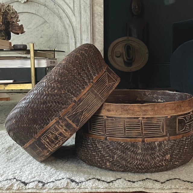 Rare Antique Makhuwa Handwoven Mavuku Container, Mozambique Size: 12.25”H x 14.25”D This rare handwoven mavuku container...
