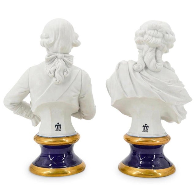 Two matching porcelain busts from the KÃ¶nigliche Porzellan-Manufaktur (KPM) depicting a royal couple: the king adorned...