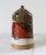 Vintage studio pottery parmesan cheese shaker with cork plug. Signed by artist. Minor age wear. No chips.