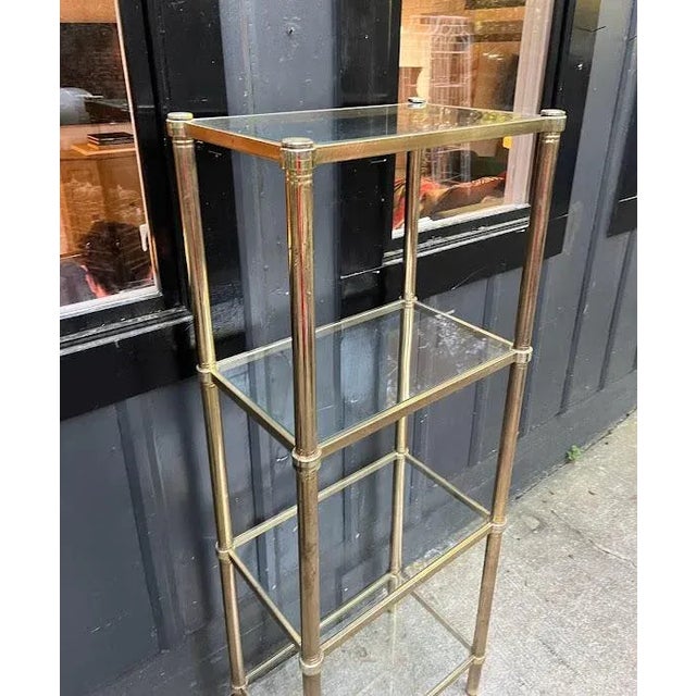 1970s glam brass post/glass etagere/bookshelf. Some minor patina to metal in a few places as shown. Otherwise excellent...