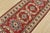 A tribal Caucasian Kazak runner hand-knotted with fine wool on a cotton foundation. This rug features a row of geometric...