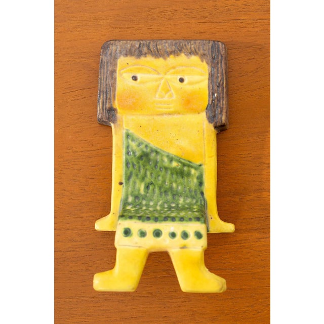 Marcello Fantoni for Raymor ceramic shelf hanging person. Glazed Ceramic. Cat pictured sold separately.