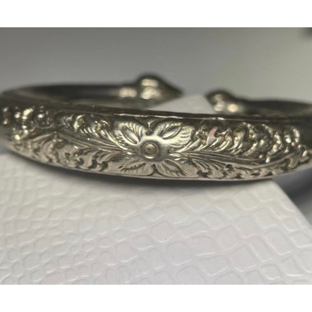 Laos bracelet by the Hill Tribes. The item is composed of sterling silver. The item is known as the golden triangle cuff....