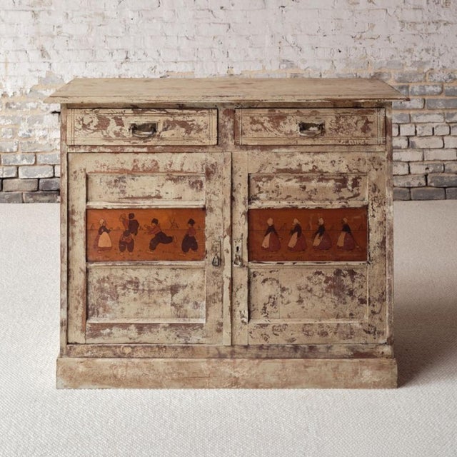 Add a playful touch of French character to your space with this 1950s French oak chest of drawers featuring a charming...