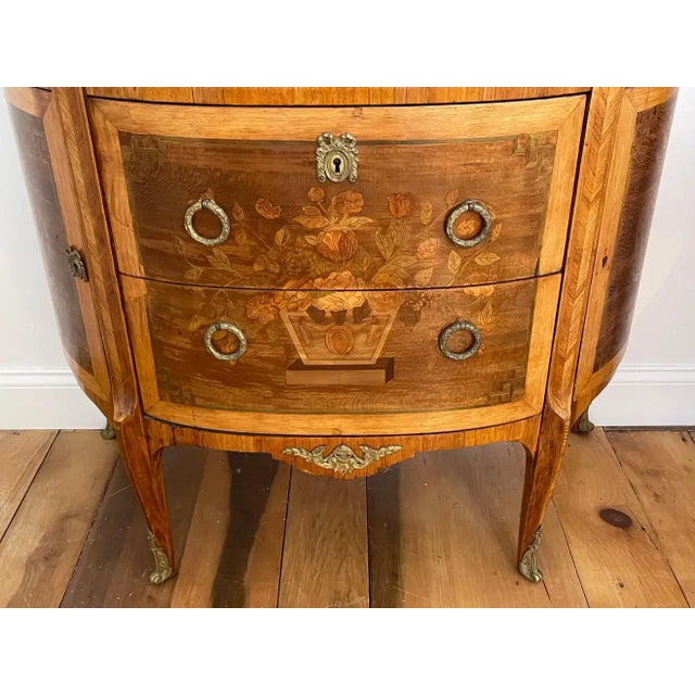 Pair of Continental Kingwood Marquetry Demilune commodes with marble tops. Beautifully inlaid with boxwood, tulipwood in...