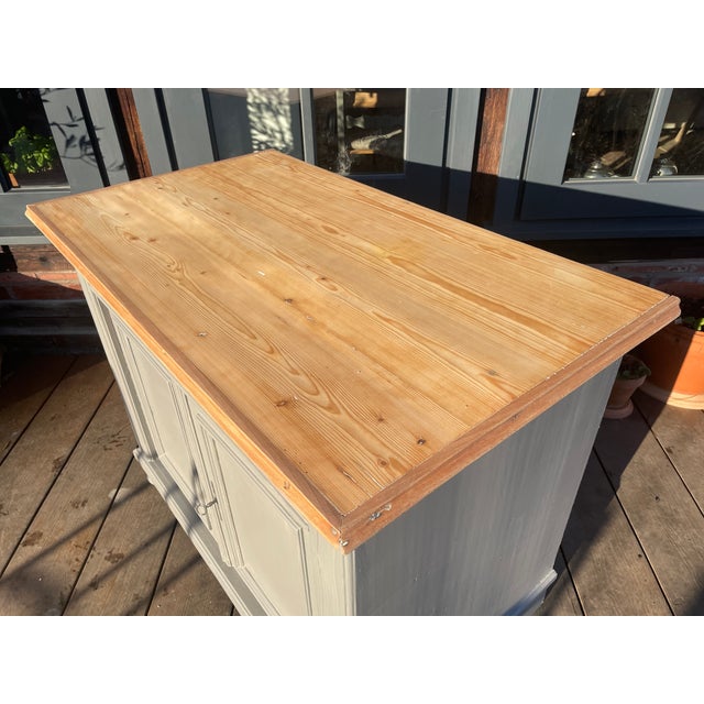 This charming antique chest of drawers (half-cabinet) has been repainted by us; the surface has been sanded and oiled. The...