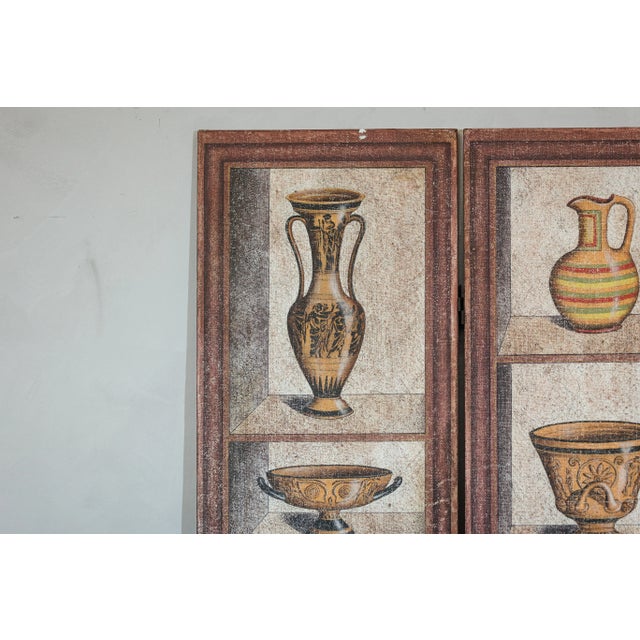 A vintage Chinese three-panel screen, designed with a trompe-l’œil effect that depicts shelves of classical vessels in the...