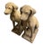 An exceptional pair of vintage mid-20th-century cast stone garden statues depicting seated hunting hounds, likely Pointers...