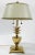 Vintage brass pineapple lamp with ivory metal tole shade. Lamp has double sockets with separate brass pulls for each bulb....