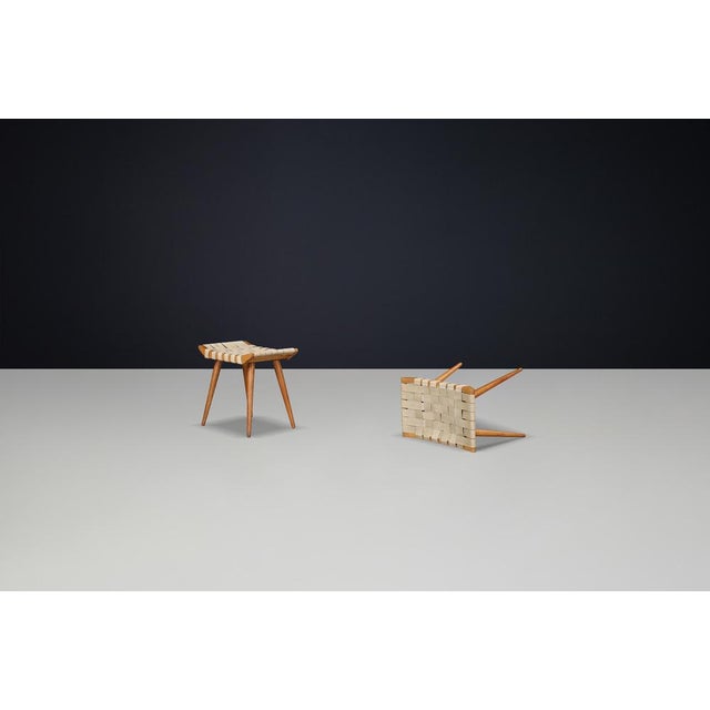 Set of 2 French Mid-Century Ash Stools with Original Canvas Webbing, 1950s This elegant pair of four-legged stools hails...