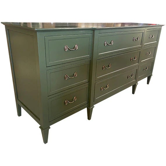 This statement-making dresser blends timeless mid-century design with a modern, refined finish. Featuring a long, low...