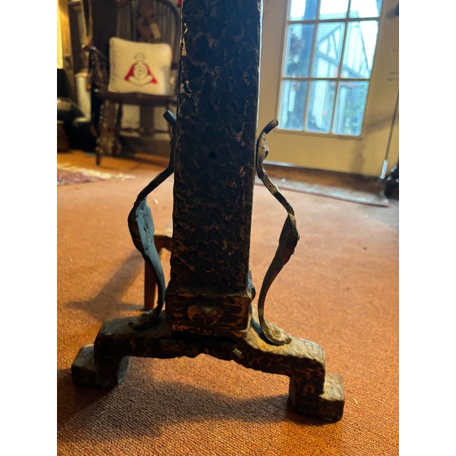 These wrought iron andirons are finely crafted with ornate, gothic detailing and large spherical tops. These are very...