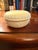 The Vintage Wedgwood Prunus Yellow Primrose Jasperware 2.75 Trinket Box and Lid is a charming collectible item made in the...