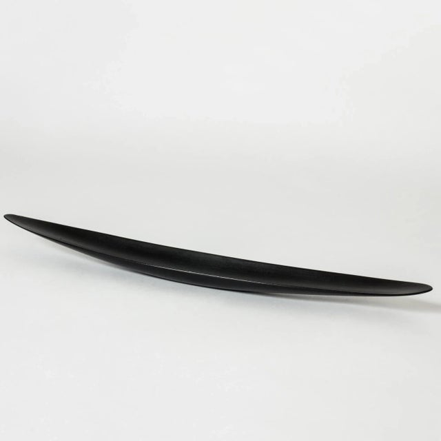Striking ebony bowl by Johnny Mattsson, in a long form with almond shaped edges. Very smooth to the touch, beautifully...