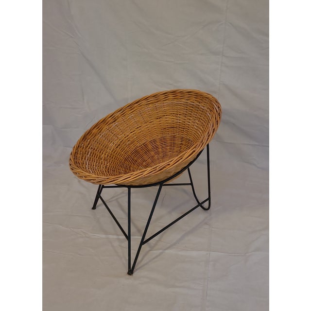 this Mid-Century woven basket chair has a great look with the bent metal base. Basket is in great condition and very...