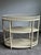 Elegant vintage McGuire San Francisco three-tier oval console shelf or bar cart featuring the brand’s iconic faux bamboo...