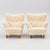 A pair of Swedish lounge chairs from the 1940s, fully upholstered and resting on birch legs. These have a very soft,...