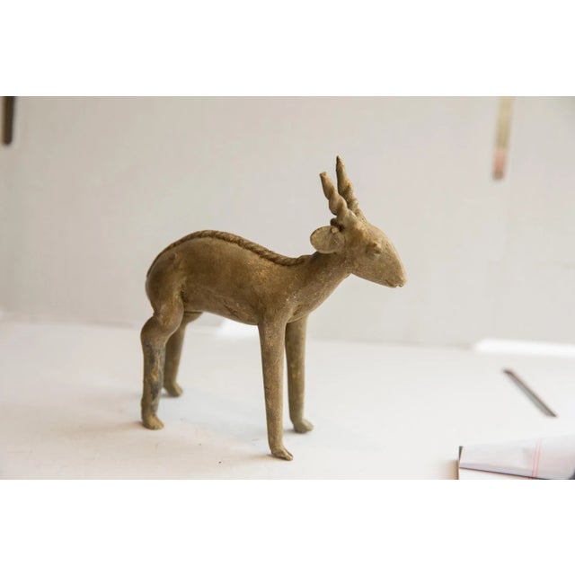 :: Vintage handmade African antelope sculpture. Circa late mid 20th century, though possibly older, this piece has such...