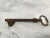 Antique English Cast Iron Key. Measures 4 1/2" X 1 1/2" X 1/4"
