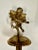 French antique solid brass cherub figurine stocking holder.