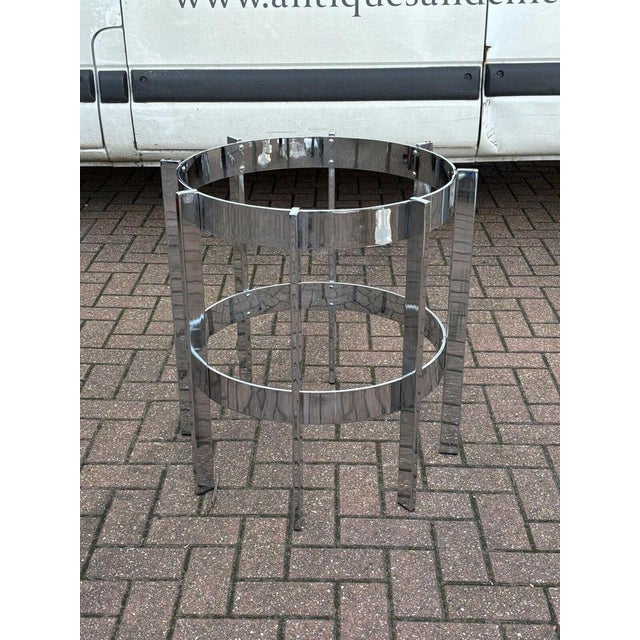 Merrow (Richard Young) Chrome Table & 6 Brown Leather & Chrome Pieff Chairs. Sizes - Table, 150 cms in diameter, 71.5 cms...